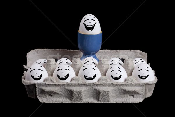 eggs with smiley faces in eggshell with a boss over their head Stock photo © ra2studio