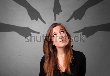 Stock photo: Young girl with devil horns and wings drawing