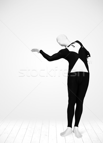 Anonim férfi bemutat termék egészalakos öltöny Stock fotó © ra2studio