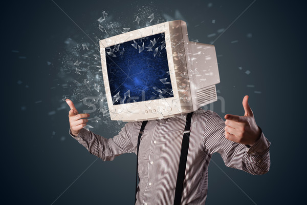 Computer monitor screen exploding on a young persons head  Stock photo © ra2studio