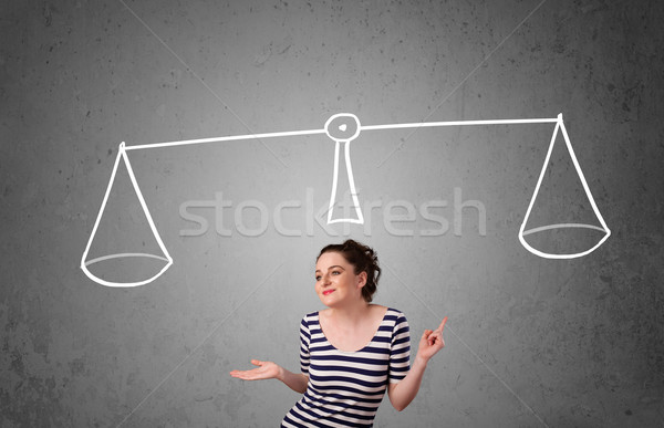 Young woman taking a decision Stock photo © ra2studio