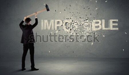 Businessman standing with umbrella keeping orange arrow  Stock photo © ra2studio