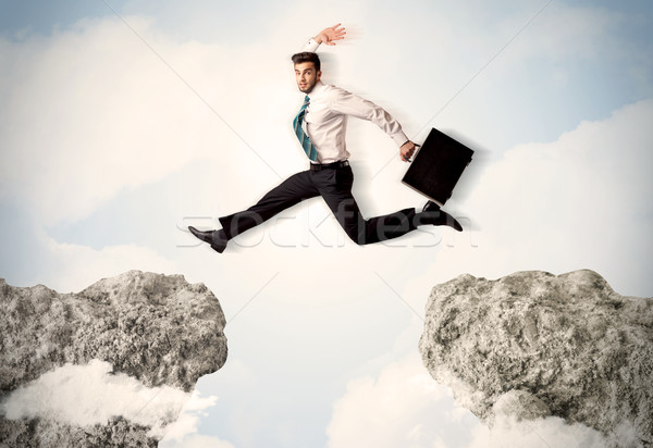 Gelukkig zakenman springen klif business man Stockfoto © ra2studio
