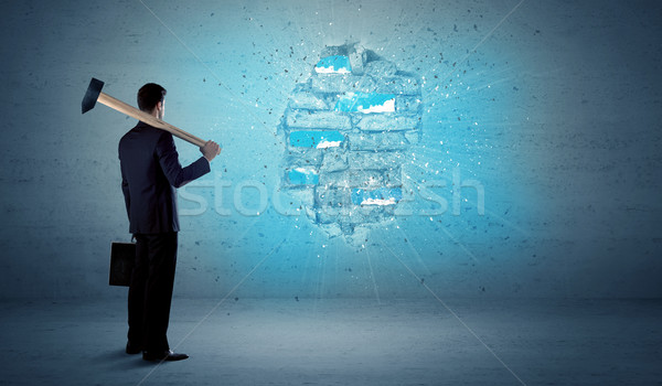 Homme d'affaires mur de briques énorme marteau homme [[stock_photo]] © ra2studio