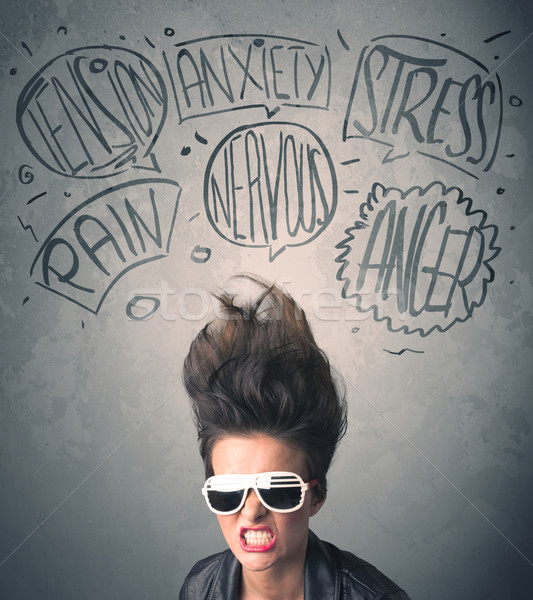 Mad young woman with extreme haisrtyle and speech bubbles Stock photo © ra2studio
