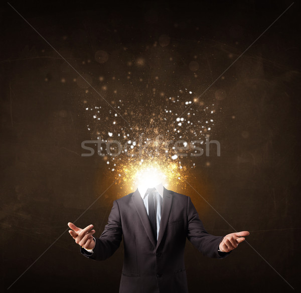 Business man with glowing exploding head Stock photo © ra2studio