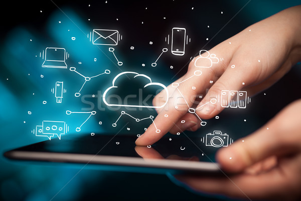Hand working on tablet with cloud technology system concept Stock photo © ra2studio