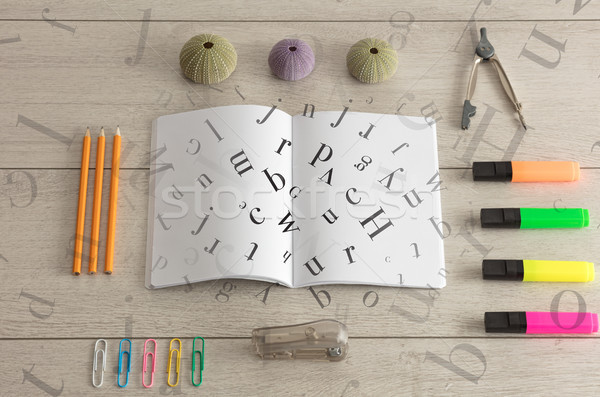 Open notebook with letters on it Stock photo © ra2studio