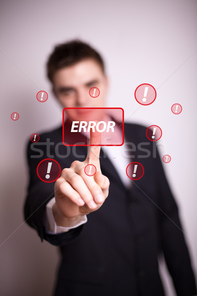 pressing error button with one hand  Stock photo © ra2studio