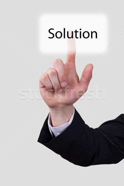 hand push on solution button Stock photo © ra2studio