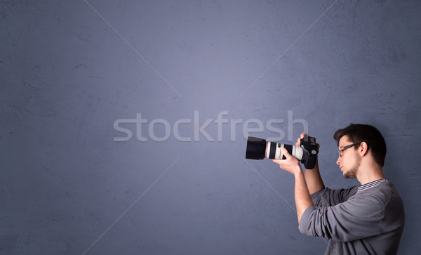 Stockfoto: Jonge · fotograaf · schieten · exemplaar · ruimte · jongen