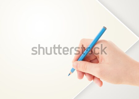 Hand writing on plain empty white paper copy space Stock photo © ra2studio