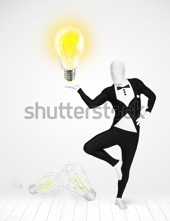 Férfi egészalakos izzó villanykörte vicces öltöny Stock fotó © ra2studio