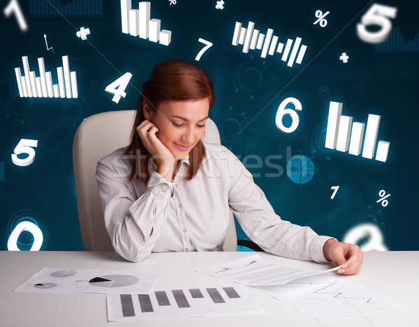 [[stock_photo]]: Jeunes · femme · d'affaires · séance · bureau · diagrammes · statistiques