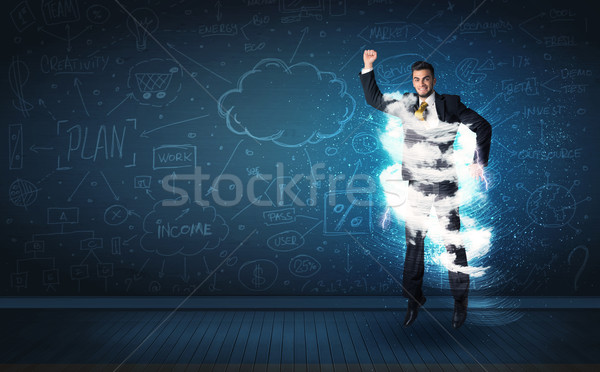 Happy business man jumping with storm cloud around him  Stock photo © ra2studio