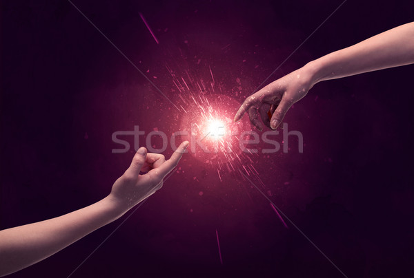 Touching hands light up sparkle in space Stock photo © ra2studio