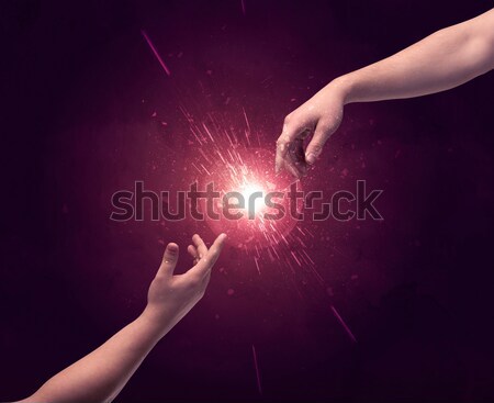 Tocar armas iluminación chispa punta del dedo dos Foto stock © ra2studio