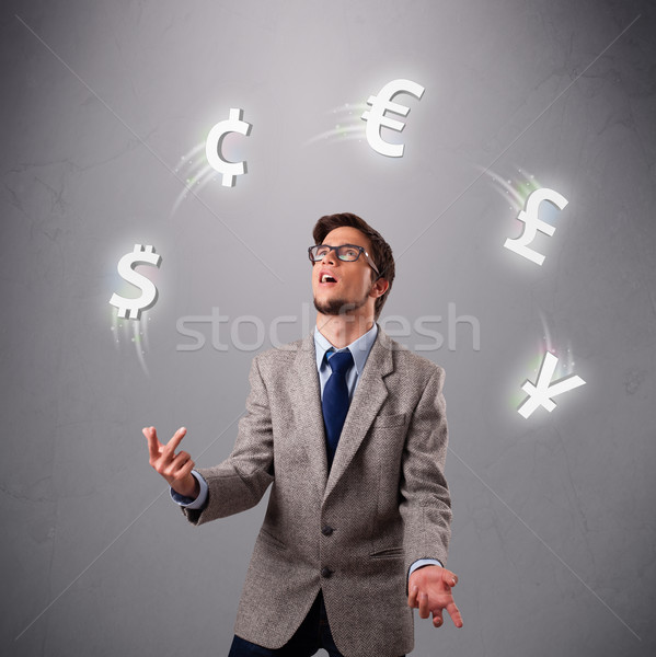 Młody człowiek stałego żonglerka waluta ikona strony Zdjęcia stock © ra2studio
