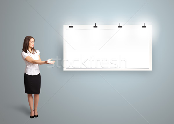 young woman presenting modern copy space Stock photo © ra2studio