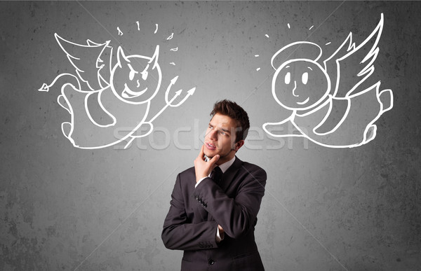 Businessman standing between the angel and the devil Stock photo © ra2studio