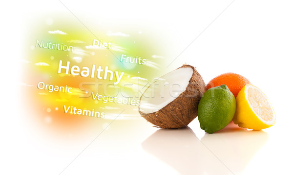 Stock photo: Colorful juicy fruits with healthy text and signs 