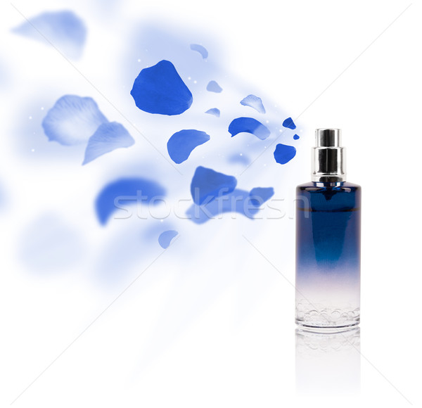 erfume bottle spraying rose petals Stock photo © ra2studio