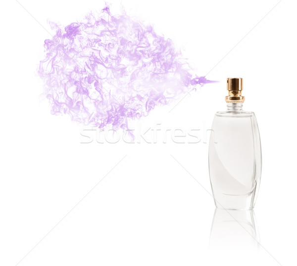 Perfume bottle spraying colored scent Stock photo © ra2studio