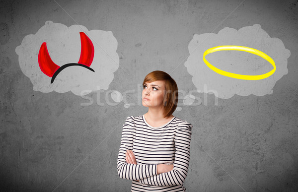Woman choosing between good and bad Stock photo © ra2studio