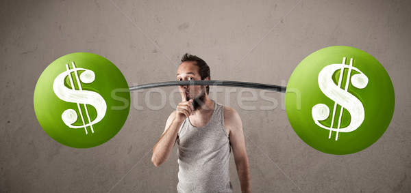 skinny guy lifting green dollar sign weights Stock photo © ra2studio