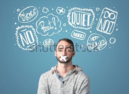 Young man with glued eye and thought clouds Stock photo © ra2studio