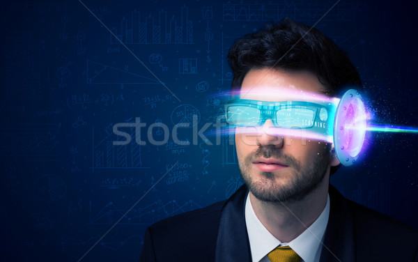 Stock photo: Man from future with high tech smartphone glasses 