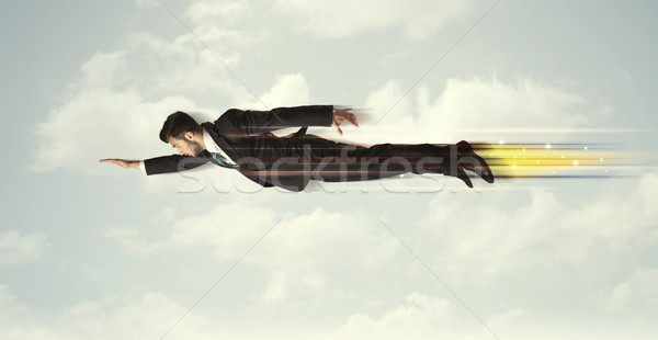 Сток-фото: счастливым · деловой · человек · Flying · быстро · небе · облака