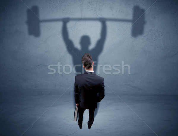 Geschäftsmann Gewichtheben Schatten jungen eleganten Verkäufer Stock foto © ra2studio