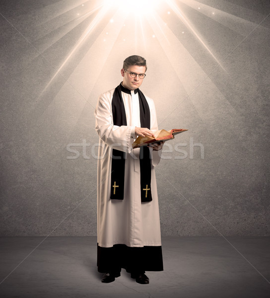 Jeunes prêtre bénédiction Homme religieux blanc noir [[stock_photo]] © ra2studio