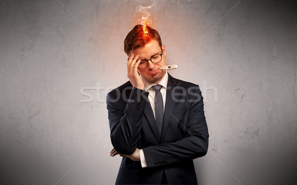 Chorych biznesmen palenie głowie gorączka medycznych Zdjęcia stock © ra2studio