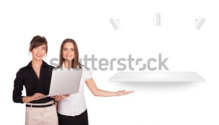 Beutiful young women presenting modern copy space Stock photo © ra2studio