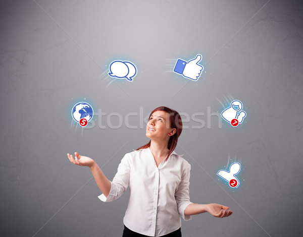 attractive young woman juggling with social network icons Stock photo © ra2studio