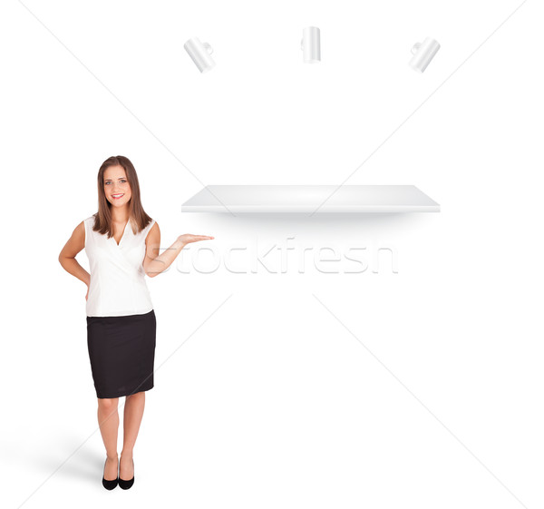 Beutiful young woman presenting modern copy space Stock photo © ra2studio