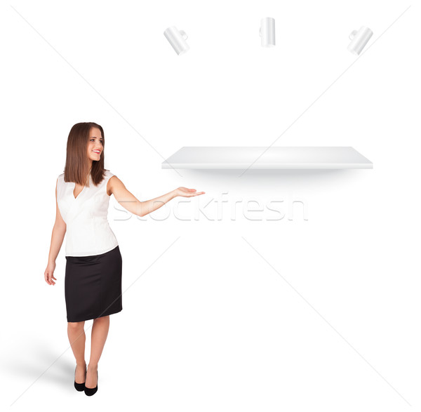 Beutiful young woman presenting modern copy space Stock photo © ra2studio