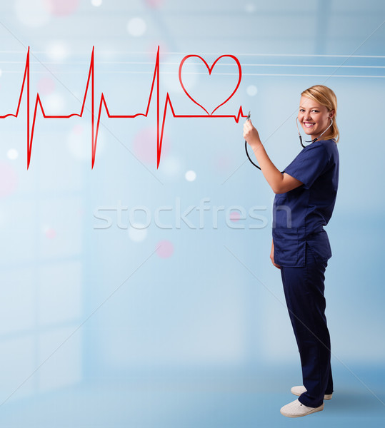 Jovem enfermeira escuta abstrato pulso vermelho Foto stock © ra2studio
