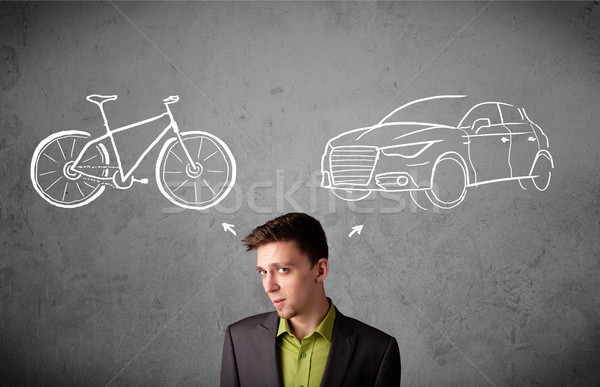 Businessman making a choice between bicycle and car Stock photo © ra2studio