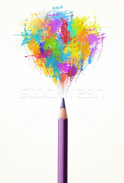 Pencil close-up with colored paint splashes Stock photo © ra2studio