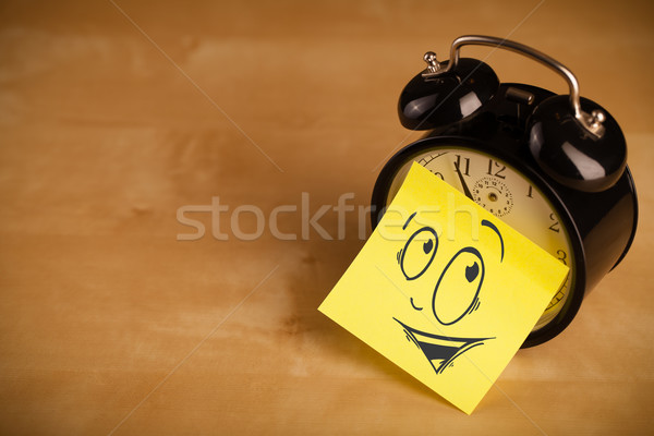 Nota cara sonriente reloj despertador negocios Foto stock © ra2studio