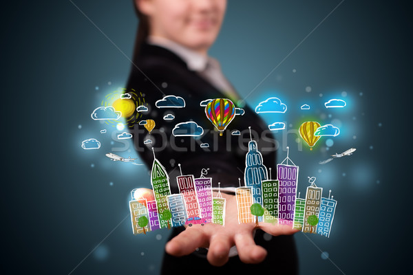 Young woman presenting colorful hand drawn metropolitan city Stock photo © ra2studio
