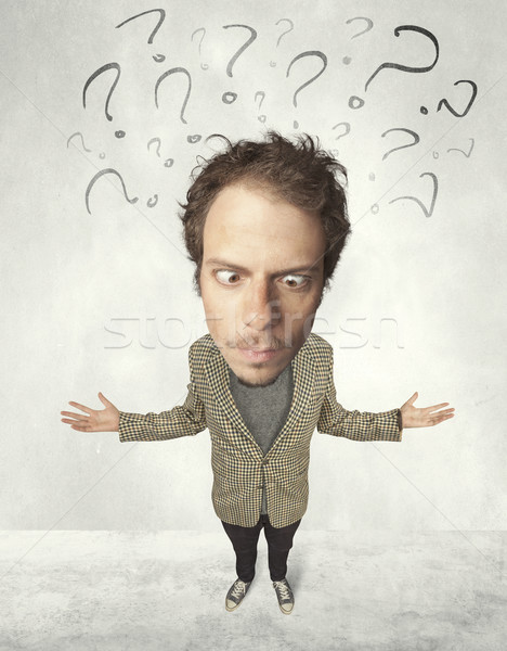 Big head person with question marks Stock photo © ra2studio