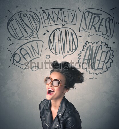 Stock photo: Mad young woman with extreme haisrtyle and speech bubbles