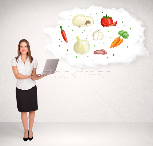 Young girl presenting nutritional cloud with vegetables  Stock photo © ra2studio