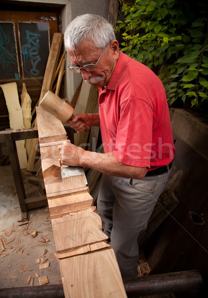 Dolgozik véső öreg kéz fa építkezés Stock fotó © ra2studio
