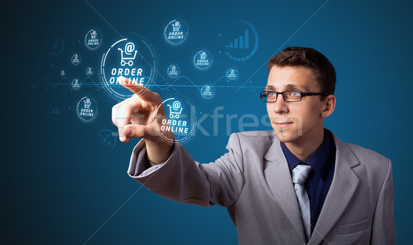 Stock photo: Businessman pressing promotion and shipping type of modern buttons