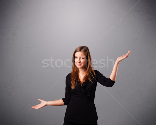 beautiful young lady juggling with copy space Stock photo © ra2studio